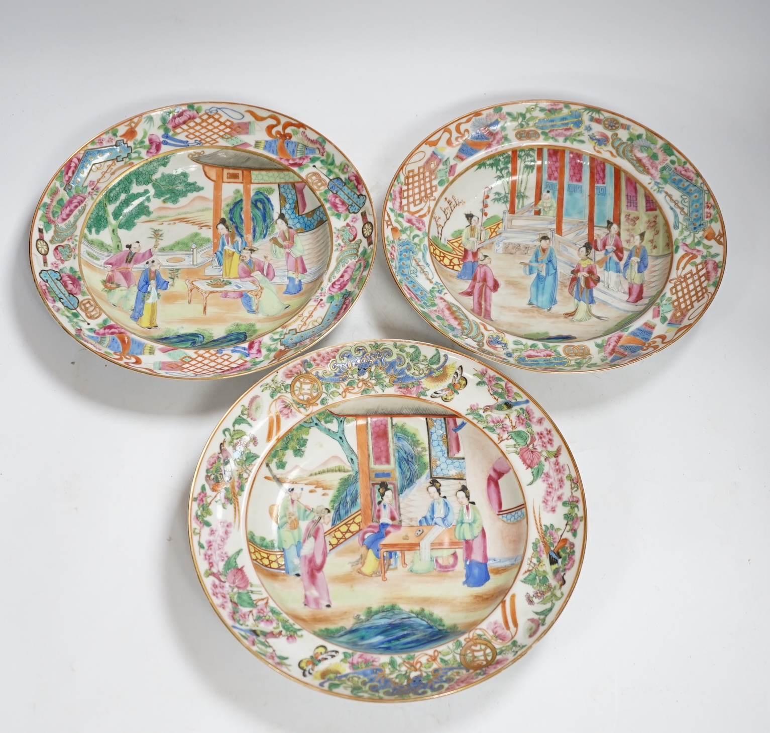 Three early 19th century Chinese famille rose soup plates, 25.5m diameter